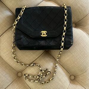 Used Chanel bag. Black cross body or shoulder. Super cute!